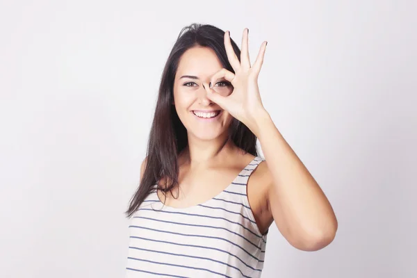 Mulher jovem com expressão engraçada — Fotografia de Stock