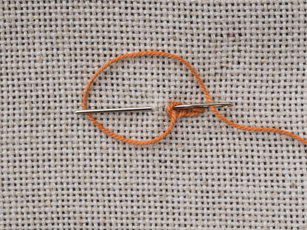 Some embroidery stitches on the canvas