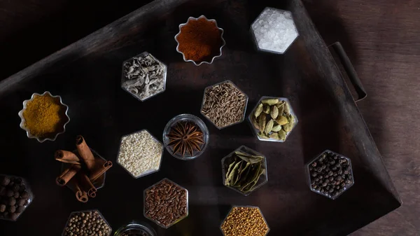 Various Spices Hexagonal Jars Appear Metal Rusty Baking Sheet — Stock Photo, Image