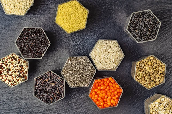 Food Background Various Cereals Grains Hexagonal Shaped Honeycomb Jars Black — Stock Photo, Image