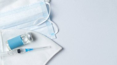 Coronavirus önleme aşısı ve koruyucu maskeler. Covid 19 salgını