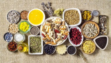 Bitkisel ve mineral organik bileşenler ve kapsüllerde beslenme malzemeleri. Vitaminler ve biyokatkı maddeleri