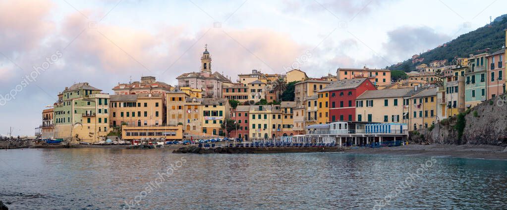 Colorful old houses in Bogliasco, beach and pier, Liguria, Italy