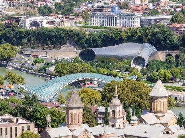Aerial view of the old town and the Bridge of Peace in Tbilisi, Georgia