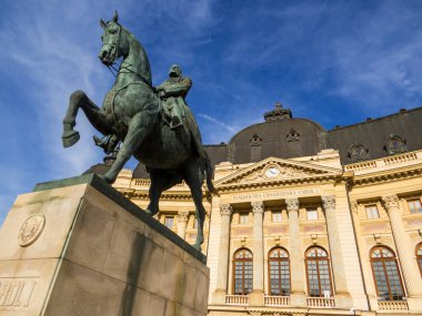 View of the Equestrian Statue of Carol I and the Carol I University Foundation, Central University Library. In Bucharest, Romania