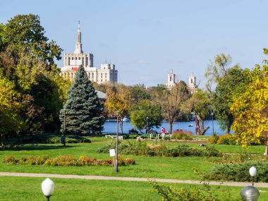 View of the King Michael I Park with the Lake Herastrau and the House of the Free Press in the background. in Bucharest, Romania