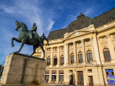 Bucharest, Romania - October 3, 2024: View of the Equestrian Statue of Carol I and the Carol I University Foundation, Central University Library.