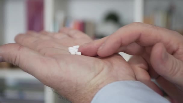 Suffering Person Taking His Medical Treatment Keeping a Pill on His Hand. Sick Person Puts in His Hand a Medical Pill. — Stock Video