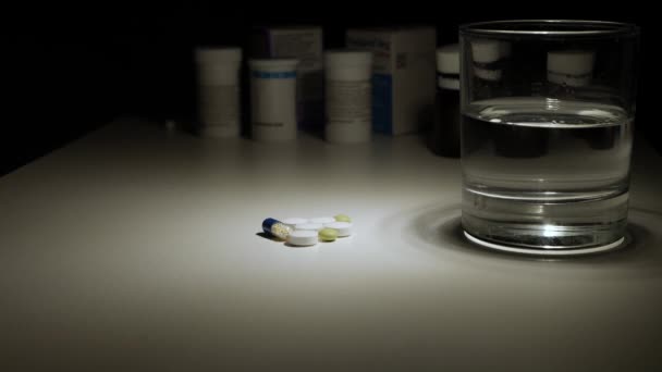 Shooting with a Sick Patient Taking Medical Pills with Water for a Terrible Headache. — Stock Video