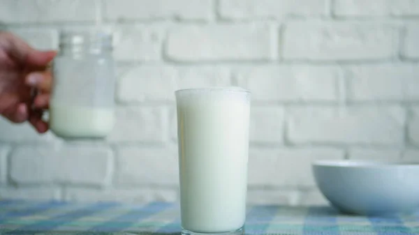 Image with a Glass with Fresh Milk at Breakfast in a Morning