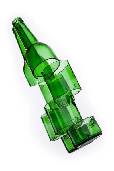 Uma garrafa fatiada em um fundo branco — Fotografia de Stock