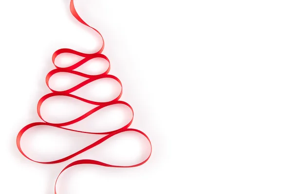 Albero di Natale dal nastro rosso Immagine Stock