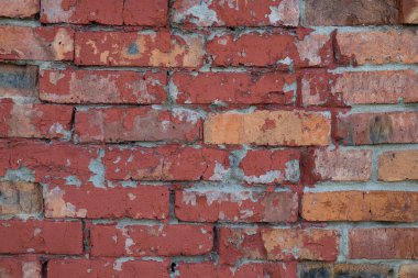 Doku arka plan kırmızı eski yıpranmış tuğla duvar. Vintage etkisi.
