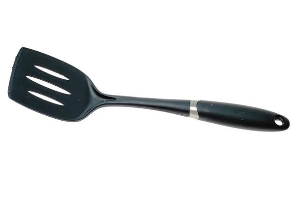 Elszigetelt fehér fekete réselt spatula — Stock Fotó