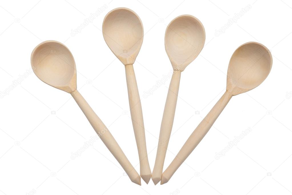 Wooden spoons isolated on white background
