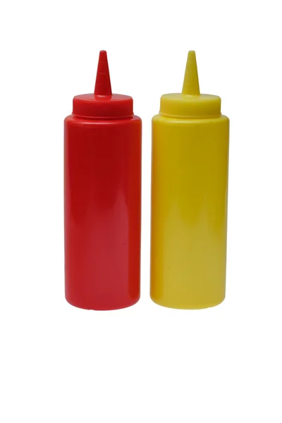 Czerwony ketchup z tworzywa sztucznego i żółta musztarda plastikowe butelki na białym tle. — Zdjęcie stockowe