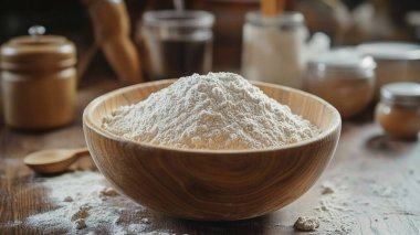 Bir kase un ve merdane masanın üstünde.