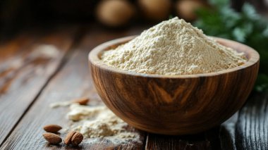 Ahşap zemin üzerinde bir kase toz olan kompozisyon