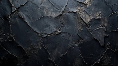 Koyu siyah taş duvar ve çatlaklar. çatlaklı taş bir duvarın dokusu.