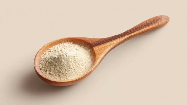 Bir kase lezzetli susam tohumu ve hafif arka planda kepçe