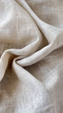 background texture, pattern, beige fabric, soft beige silk fabric. this soft and smooth silk, this luxurious a luxurious cotton or cotton yarns