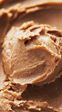 peanut butter spread on spoon.