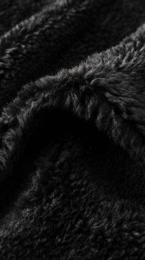 Siyah ve beyaz arka plan, kumaşın soyut dokusu, yumuşak ten, güzel bir desen. Şatafatlı bir kumaş, tasarım. güzel duvar kağıdı