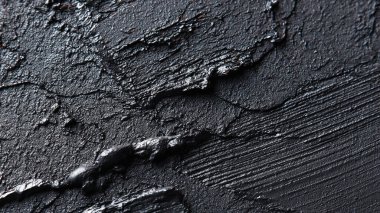 Siyah arka planda siyah boya. soyut arkaplan, kapat - yakın görünüm.