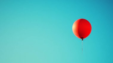 Mavi arkaplanda kırmızı balon