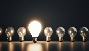 Koyu arkaplanda fikir kavramına sahip bir ampul