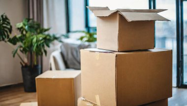 boxes with cardboard and a stack of paper.