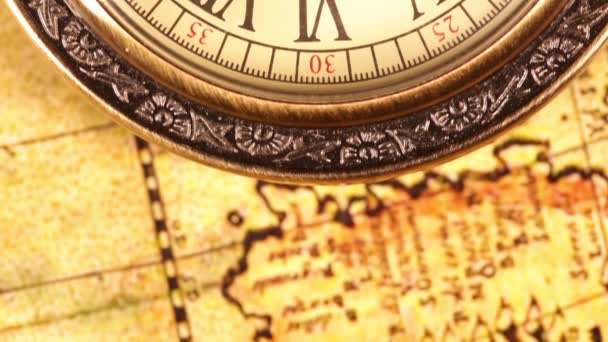 Vintage clocks on the map. Old world map in 1565. — Stock Video