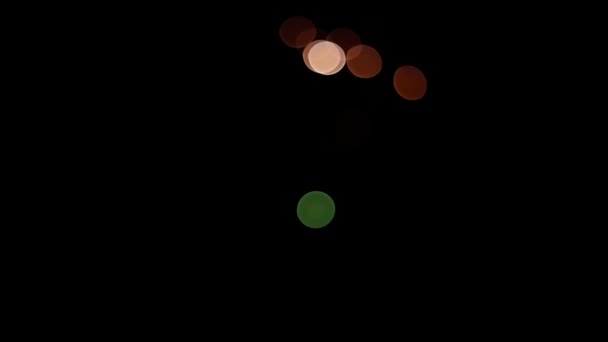Vielfarbiges Lichtmaterial auf schwarzem Hintergrund. Overlays, Bokeh-Effekt, Übergänge. — Stockvideo
