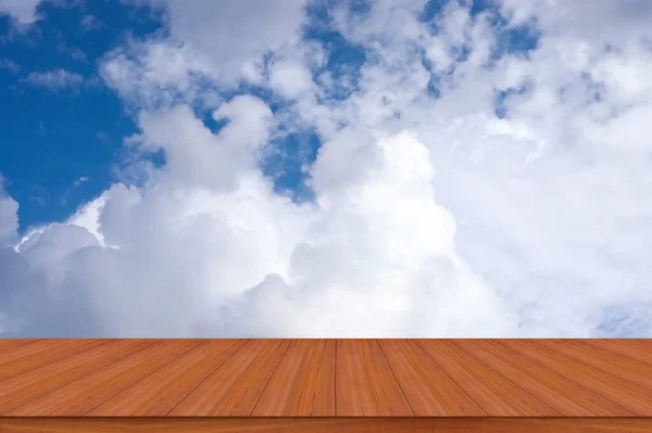 Wooden table with empty blue sky display advertisement backgrounds