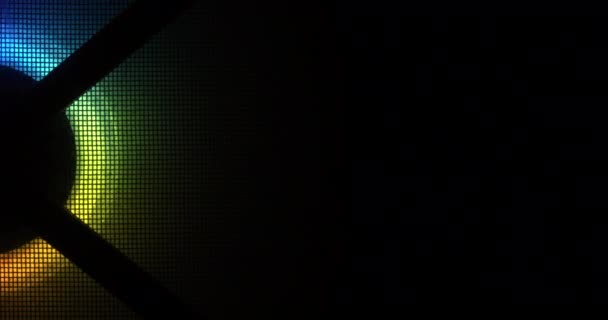 Rainbow RGB computer fan in computer case on dark background — 图库视频影像