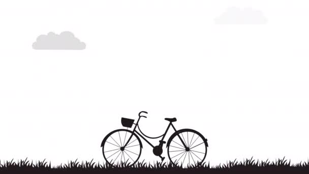 Kerékpár sziluett a pályán fűmozgás animációval.
