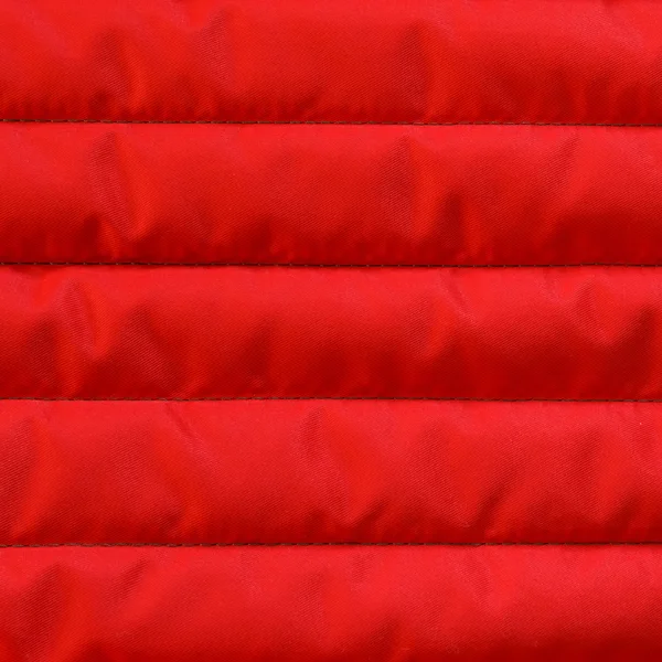 Têxteis acolchoados vermelhos com textura de isolamento . — Fotografia de Stock