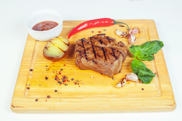 Club Beef steak with pepper sauce and Grilled vegetables on 