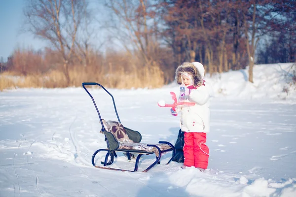 Winter - lovely girl has a fun in snow — Stock Photo, Image