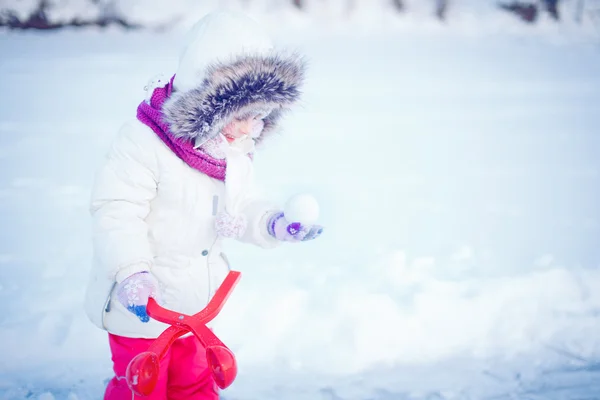 Winter - lovely girl has a fun in snow — Stock Photo, Image