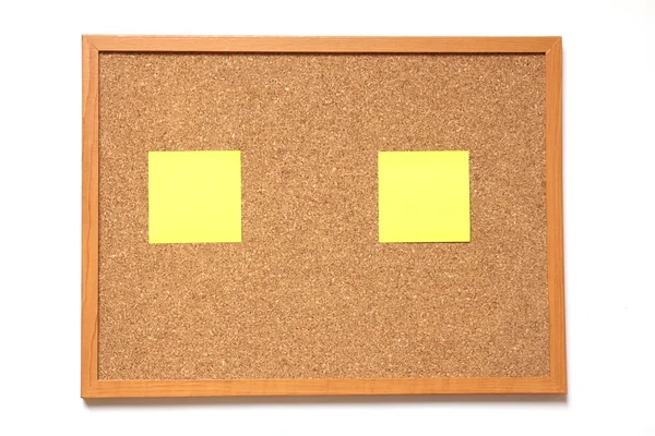 Corkboard beyaz arka plan hakkında kağıt