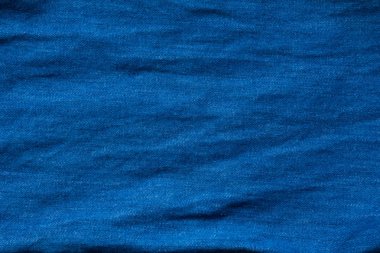 Mavi buruşuk denim jeans dokusuna kapandı 