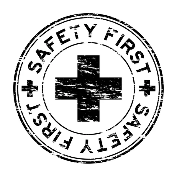 Grunge black safety first stamp — Stock Vector