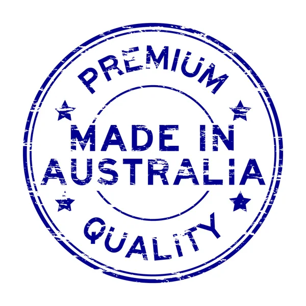 Azul grunge feito em austrália carimbo de borracha sobre fundo branco — Vetor de Stock
