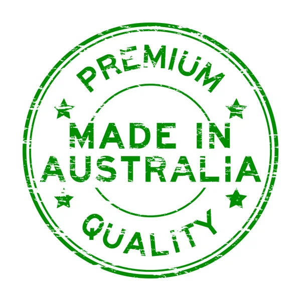 Grunge verde hecho en australia sello de goma sobre fondo blanco — Archivo Imágenes Vectoriales