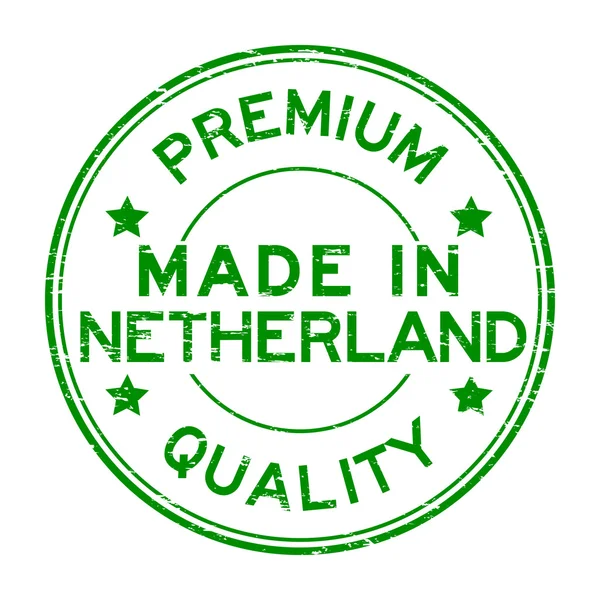 Grunge zelené prémiové kvality a jsou vyrobeny v Holandsku razítko — Stockový vektor