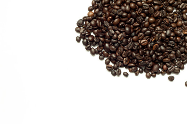 Roasted brown coffee bean on white background