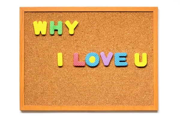 Wording why i love u in corkboard plaziert auf weißem Hintergrund — Stockfoto