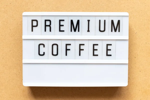 Lightbox Con Palabra Café Premium Sobre Fondo Madera — Foto de Stock