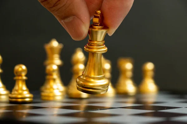 Business Man Hold King Move Chess Game Black Background Concept — Stock Photo, Image